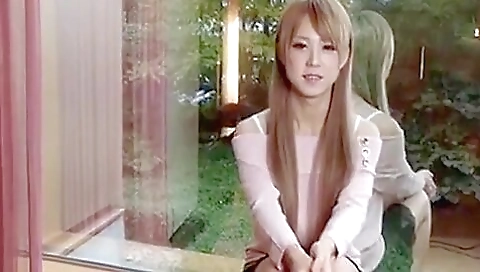 Asian girl with a sexy body is stripping in front of the camera