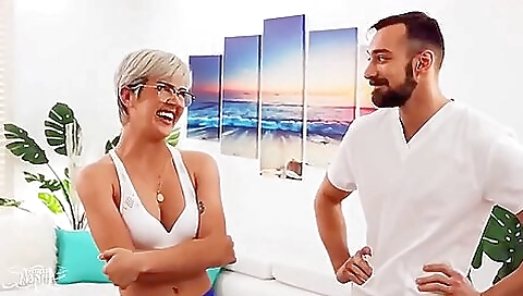 Blonde teen with big tits gives a nice massage for the guy