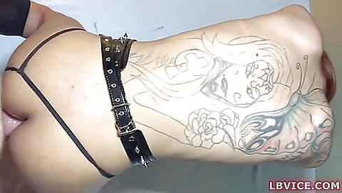 Tattooed blonde lady-boy has her tight ass filled with cum