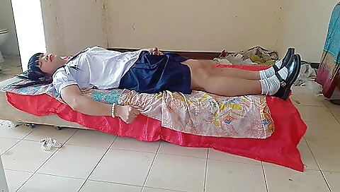 Schoolgirl with a cute body wearing a sexy white dress